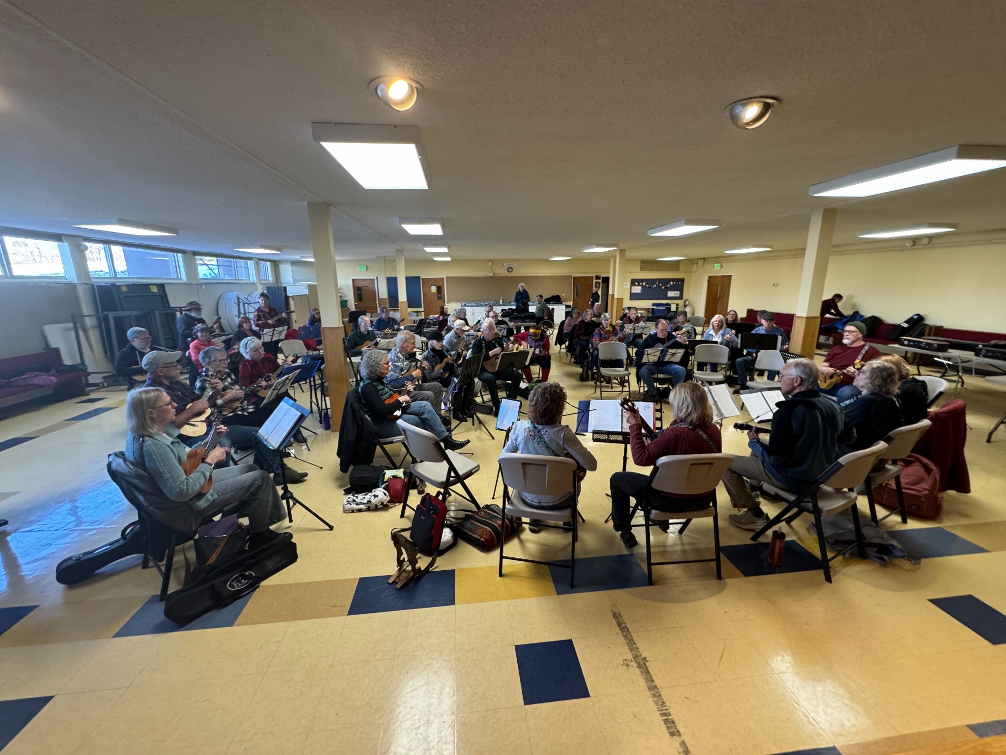Boulder Ukulele Group playing together at a community gathering